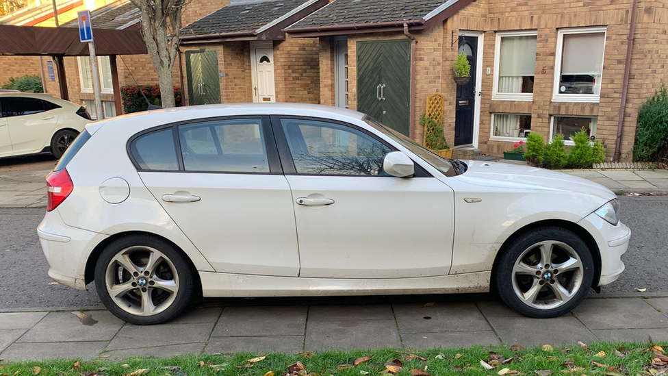 car parked on pavement