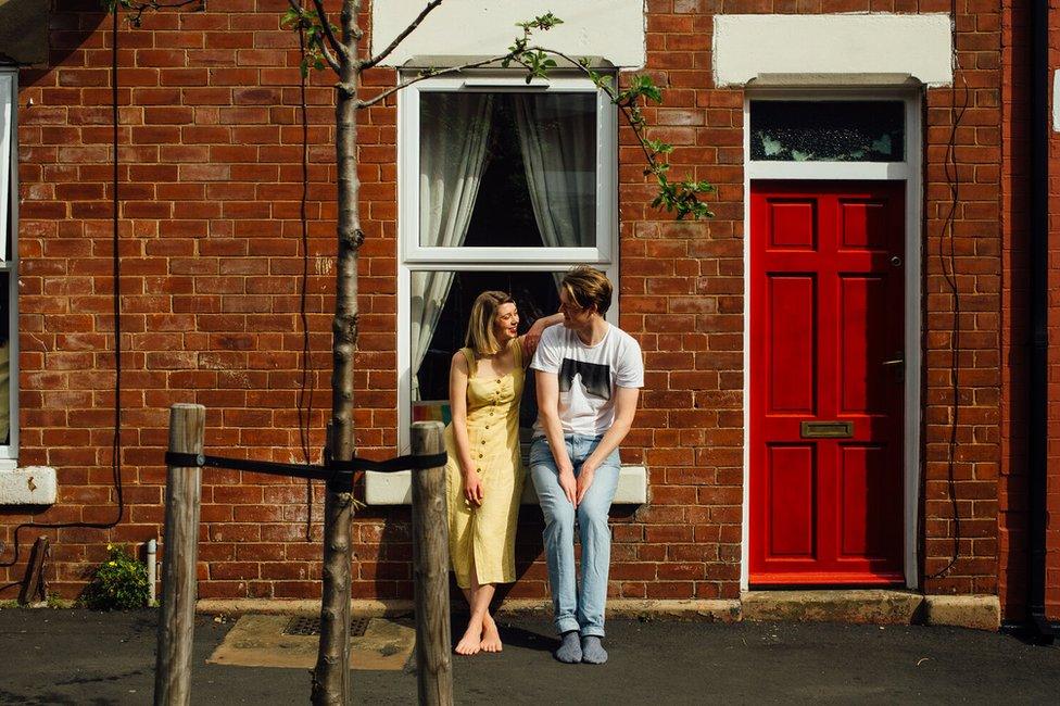 Doorstep portrait of Emma and Pete in Sharrow