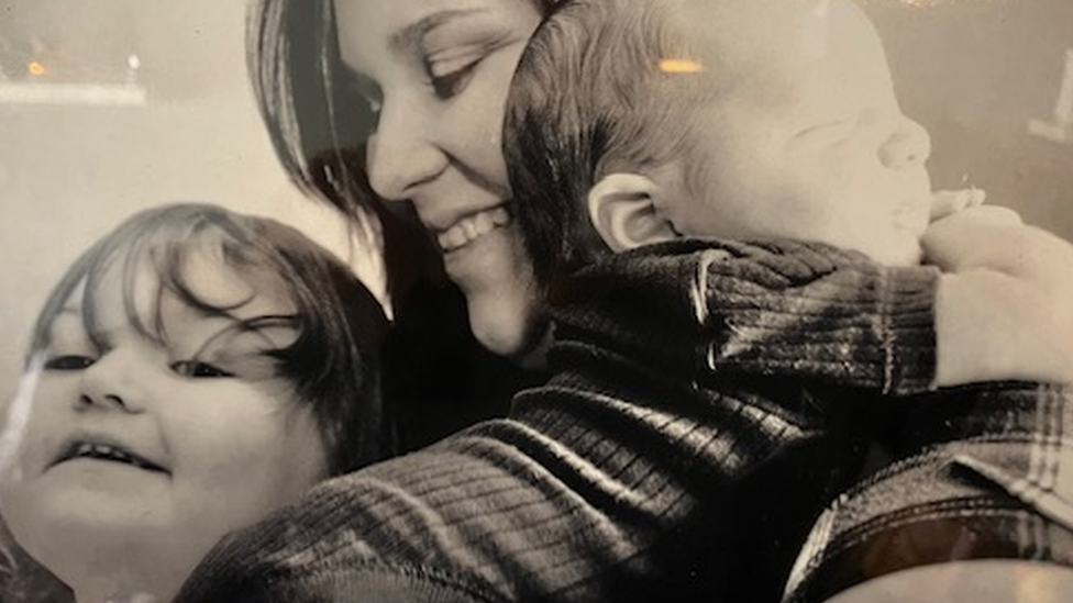 Lainee aged 2 with her mother Claire and baby sibling