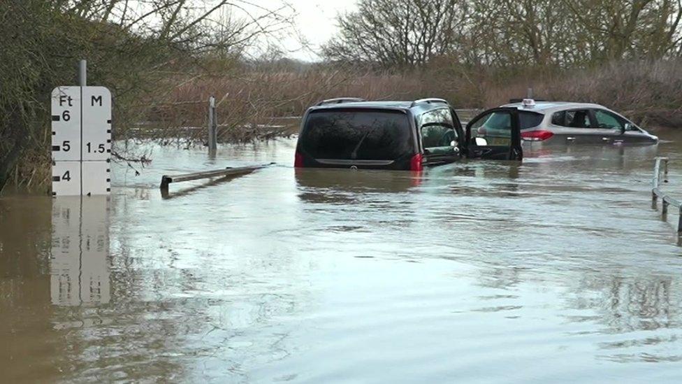 Cars in deep water