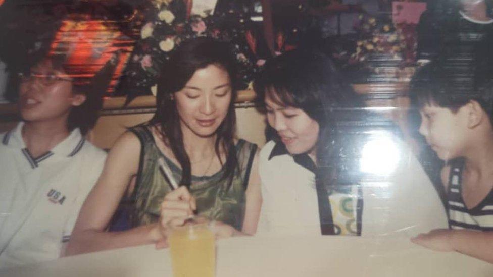 Cody Foo and his mum supporting Michelle Yeoh at the opening of her restaurant in Ipoh in 1996