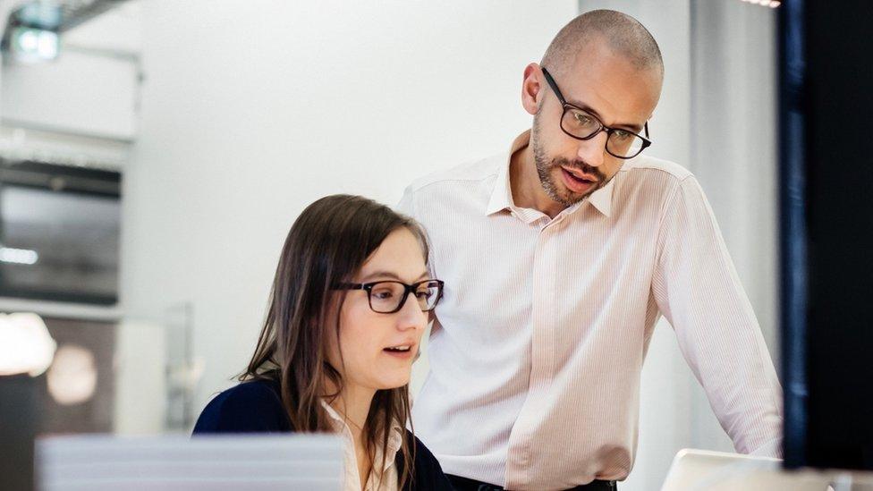 Stock image of office workers