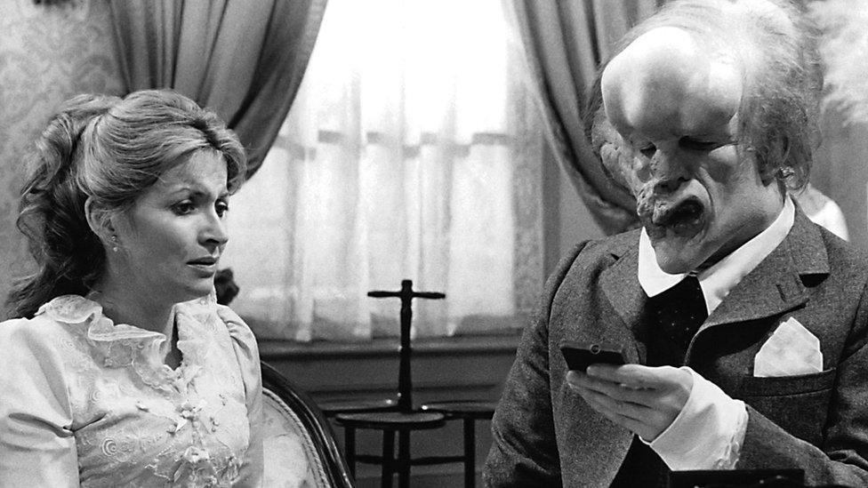 British actors John Hurt, as John Merrick, and Hannah Gordon as Ann Treves in The Elephant Man