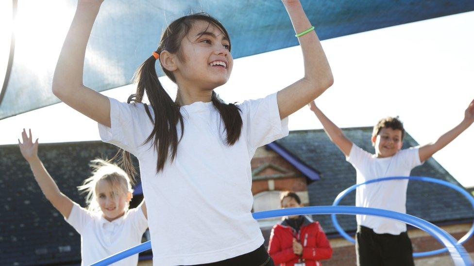 School children take their PE lesson