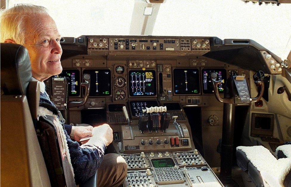 Dr David Warren pictured smiling in the cockpit of a Boeing 747, on 26 August 1998.