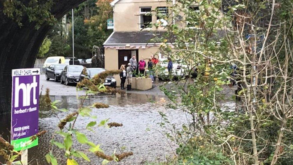 A road into Aberdulais has been blocked by flood water