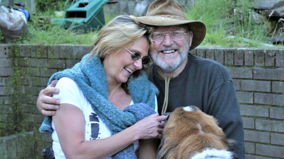 Melanie and Mike Davies with their dog Bruno