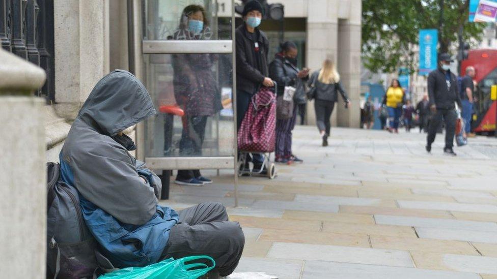 Homeless person sleeping near Charing Cross Station, London, June 2021