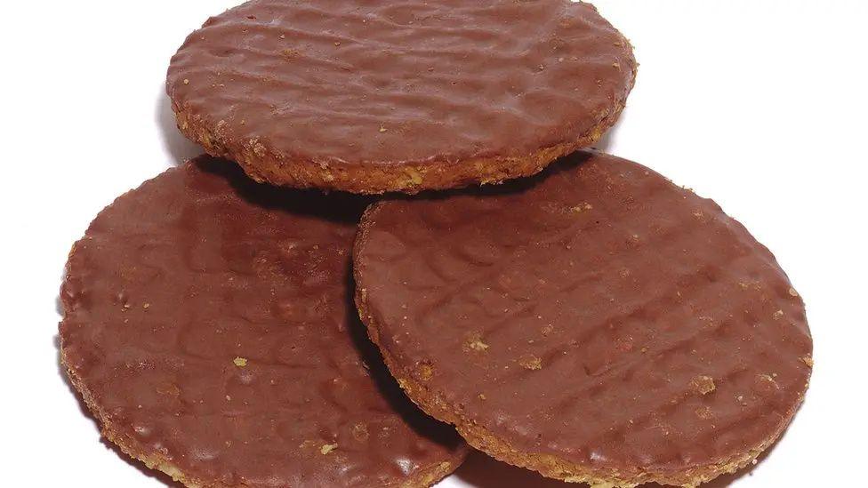 A publicity shot of three Hobnob biscuits