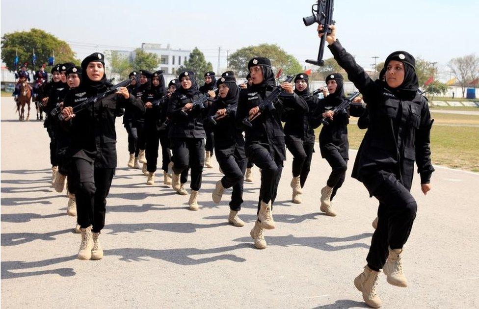 Female members of police commandos march during at their headquarters in Islamabad, Pakistan