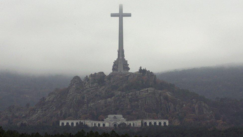 A heavy fog lies over the Valle de los Caidos (Valley of the Fallen) monument on November 20, 2005 in El Escorial, Spain