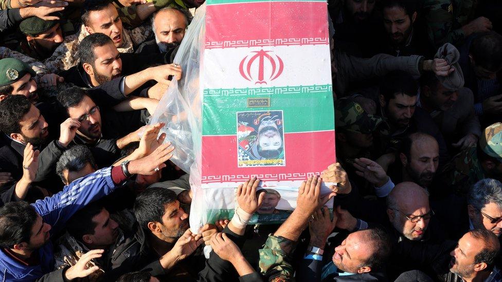 Mourners carry the coffin of Brigadier General Mohammad Ali Allahdadi in Tehran