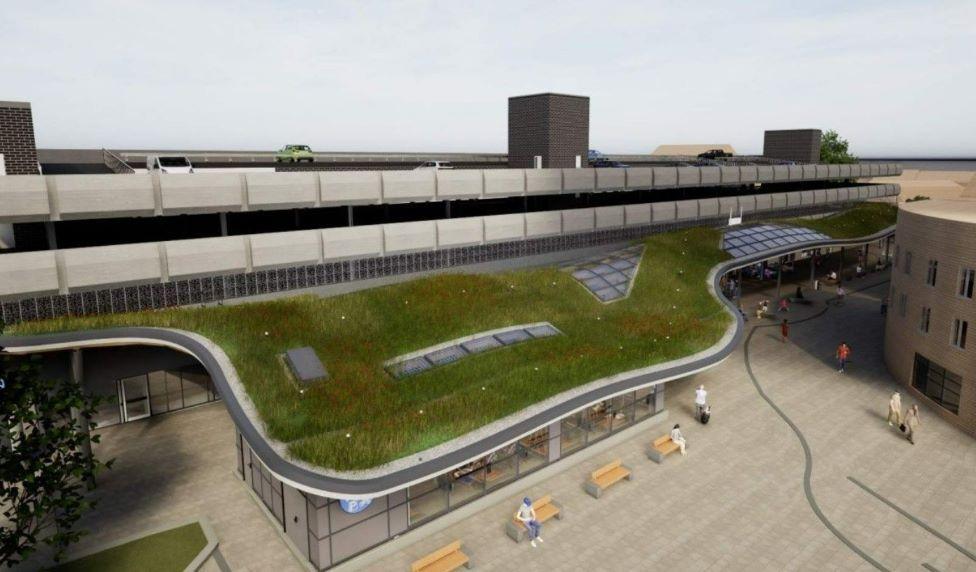 An aerial view showing how the new bus station could have a green roof with plants, grass and benches