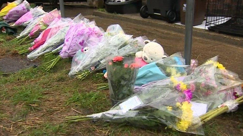 Floral tributes outside the home