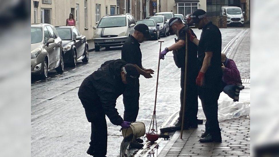 Police searching drains in Boston