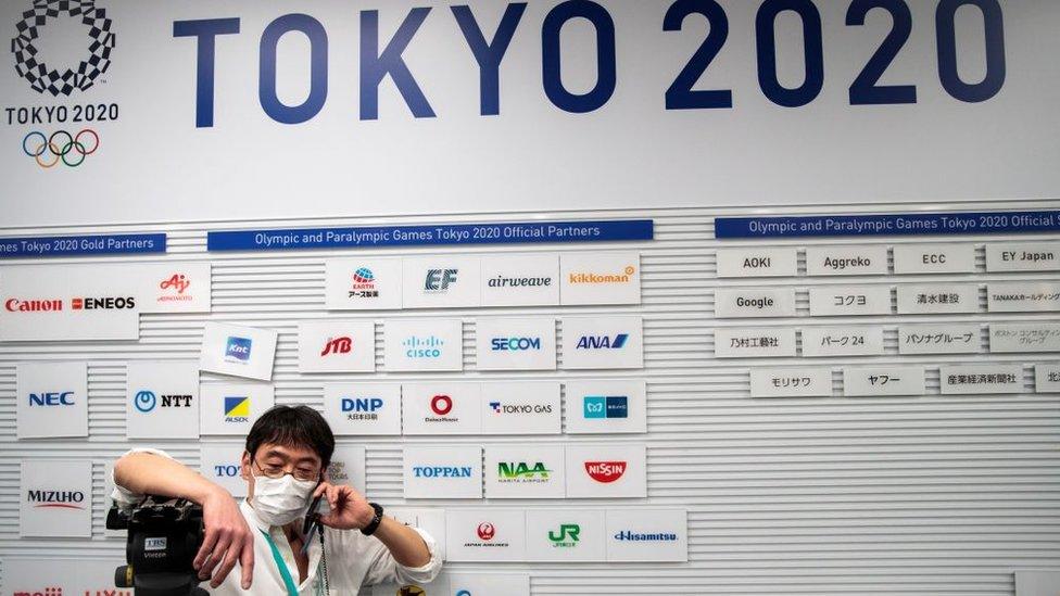 A cameraman at the Tokyo Olympics