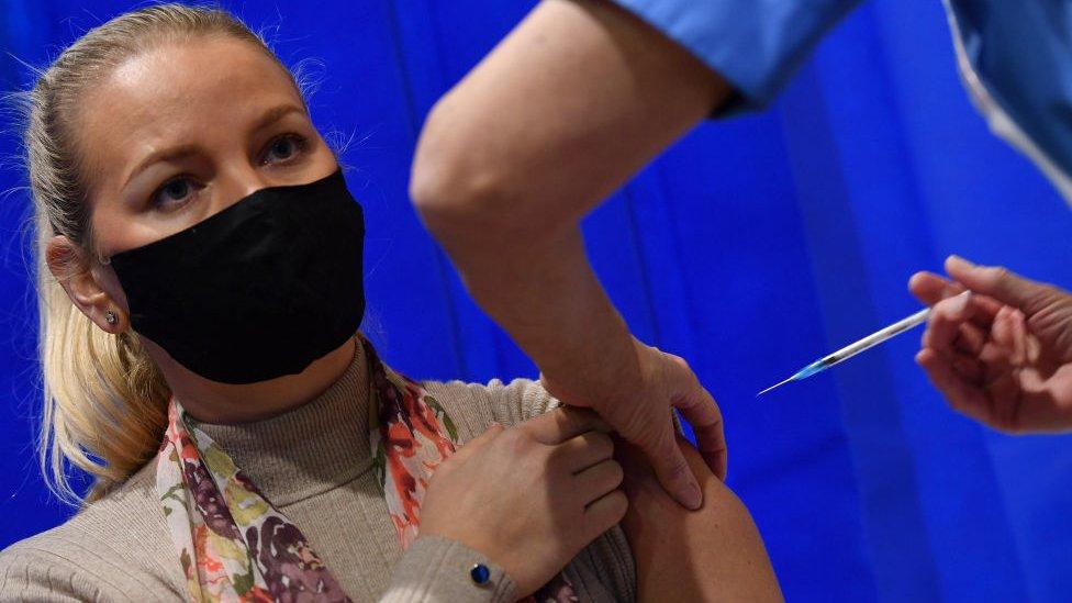 A woman getting the Covid vaccine