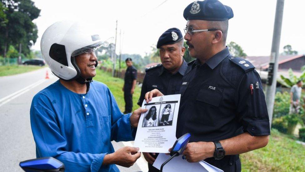 Motorist and search police officer