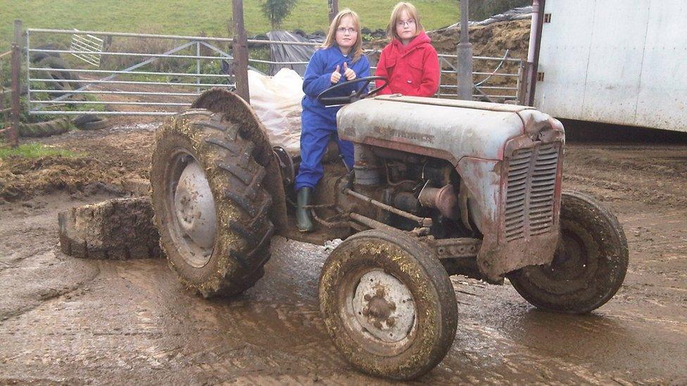 Anna and Laura Callwood as children on the family farm