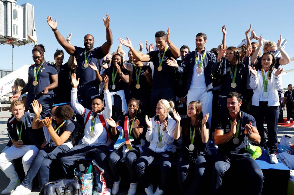 French medallists celebrating at Paris Roissy-Charles De Gaulle airport, 23 Aug 16