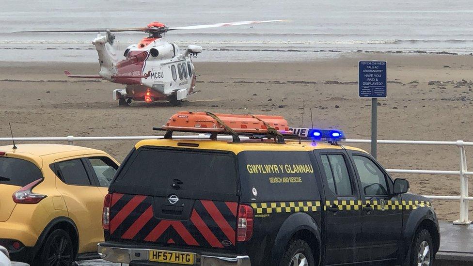 The coastguard helicopter on the beach at Neath Port Talbot