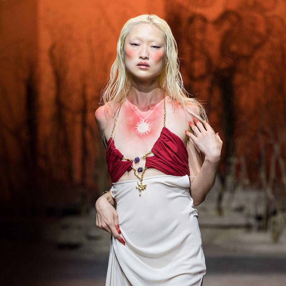 A model wearing makeup which looks like sunburn walks the runway during Di Petsa Spring / Summer 2025 show at 40th London Fashion Week on September 13, 2024.