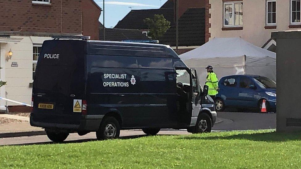 Police at the cordon in Walton Cardiff near Tewkesbury