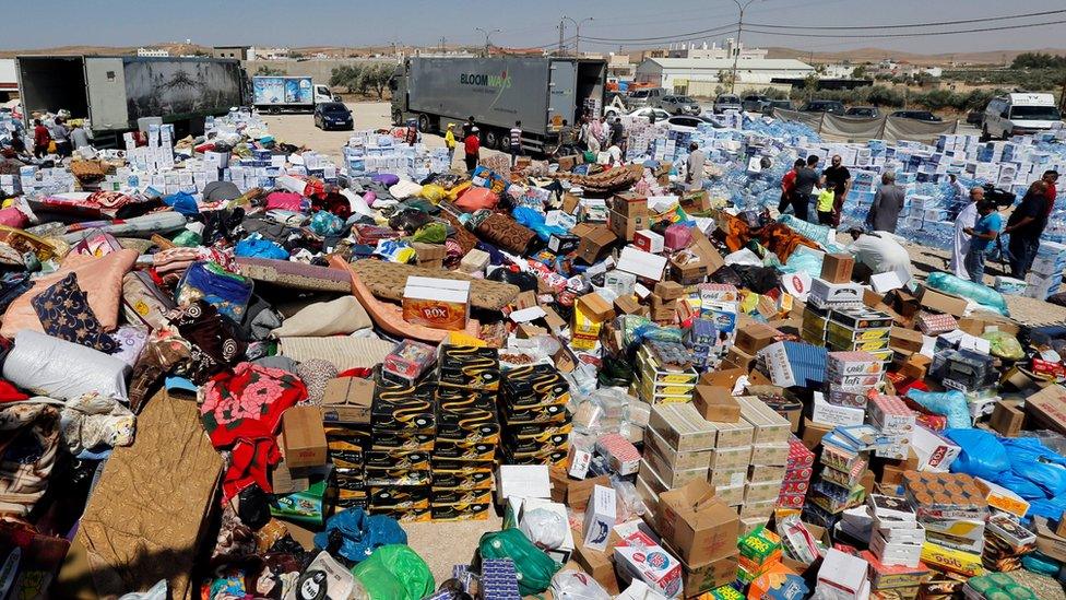 Humanitarian aid is prepared to be delivered to Syria, in the town of Ramtha, Jordan, (2 July 2018)