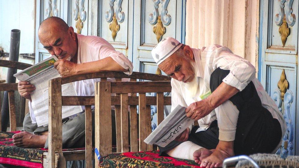 Uighur people in China's Xinjiang Uighur Autonomous Region's Kashgar city, 7 July 2015