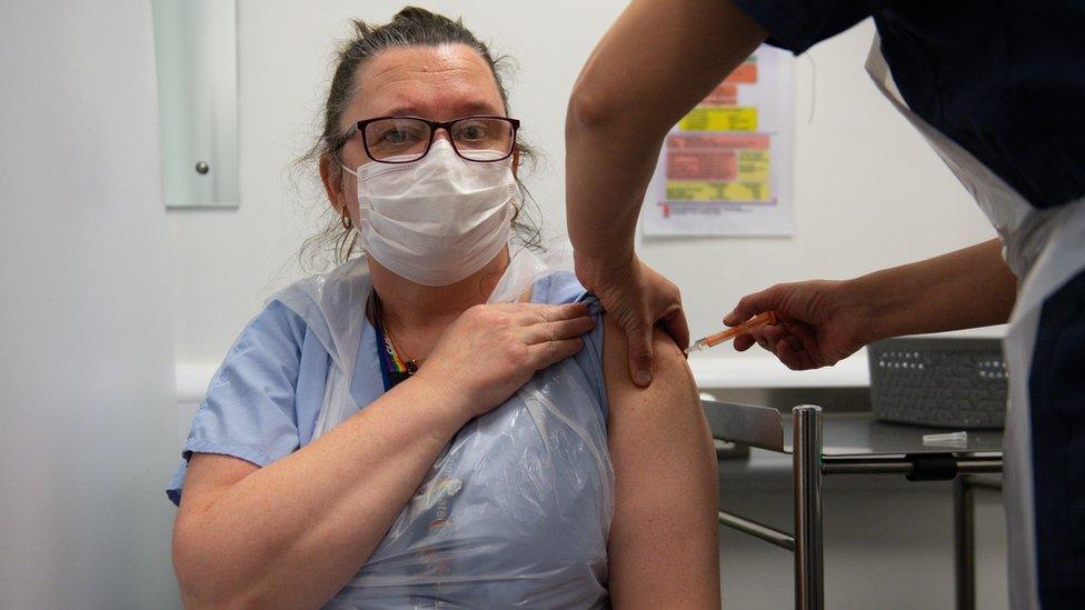 Nurse Sue Toye, 51, one of the first people to receive the Oxford-AstraZeneca Covid-19 vaccine in a GP practice in England, having the vaccination at Priory Gate Surgery at the City of Coventry Health Centre in Coventry