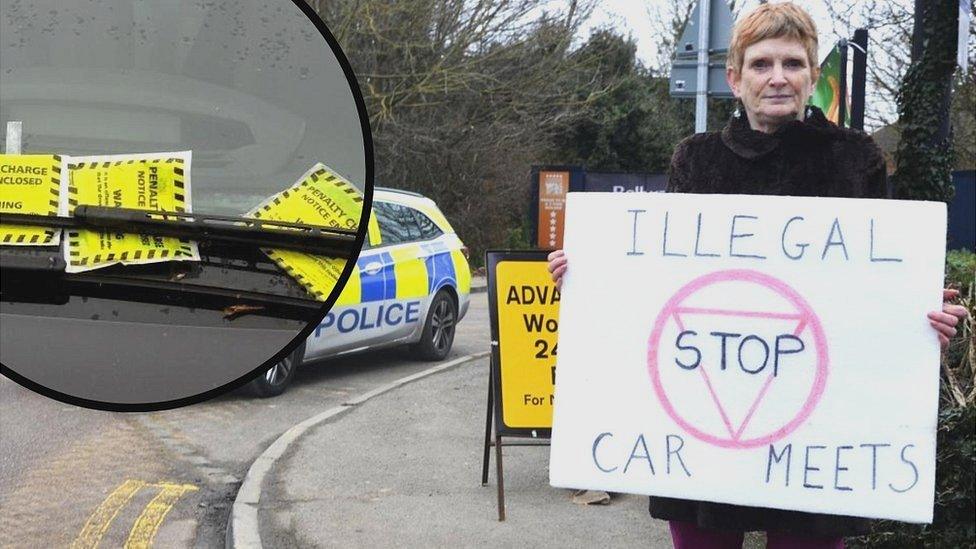 Woman holds sign at protest