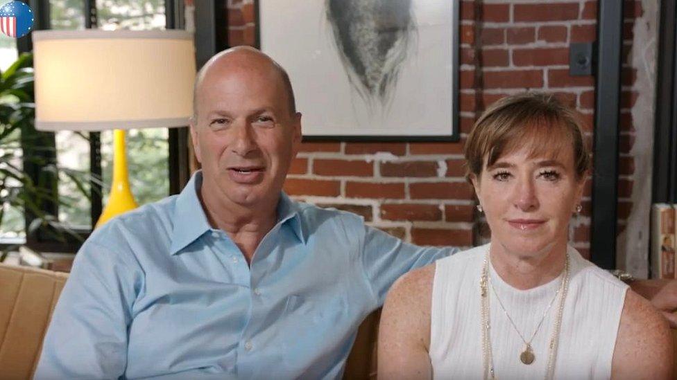 In a US embassy video, Mr Sondland introduces his wife Katy Durant (R) and their two children