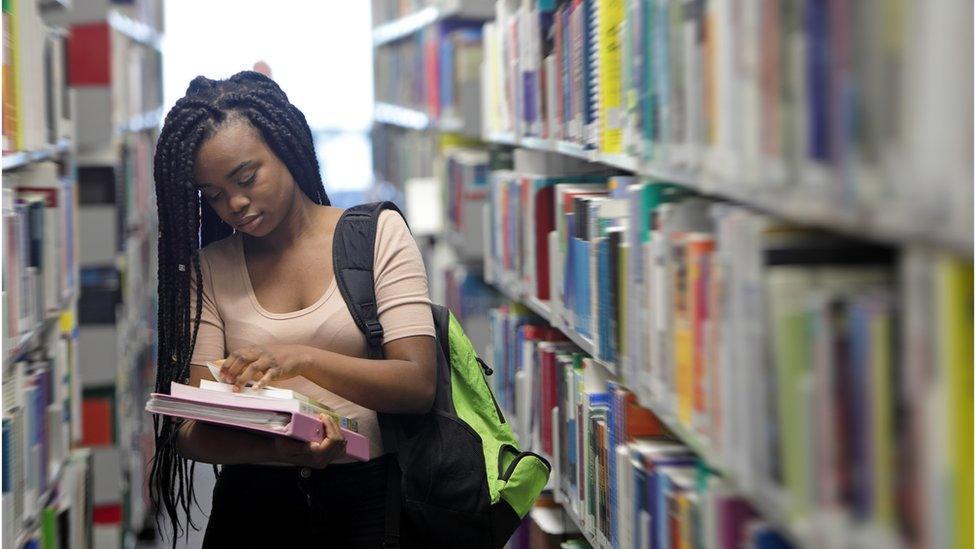 Student in a library