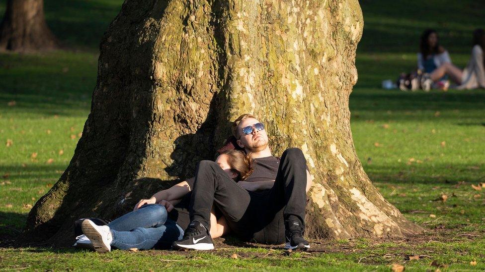 A couple relax in the sun