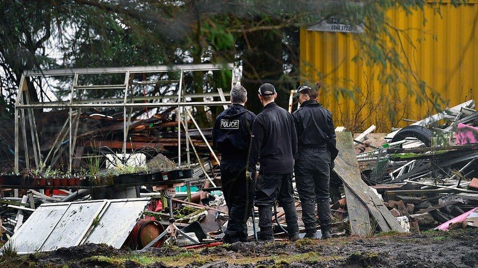 police searching garden