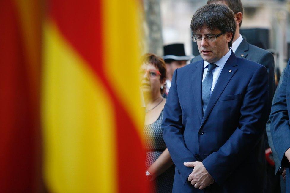 Carles Puigdemont attends a wreath-laying ceremony at the Rafael de Casanovas monument in Barcelona, 11 September