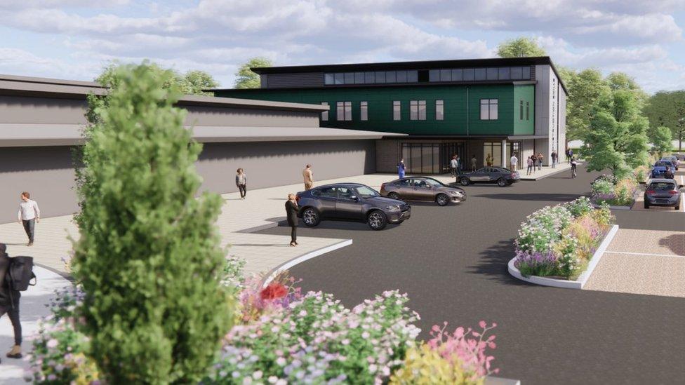 An artist impression of new training centre showing cars parked nearby