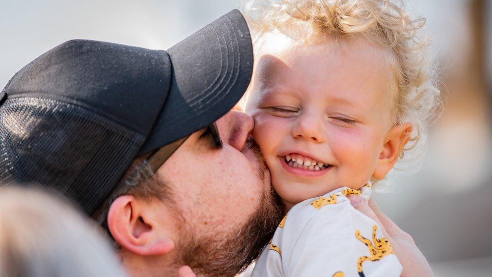 George with his father