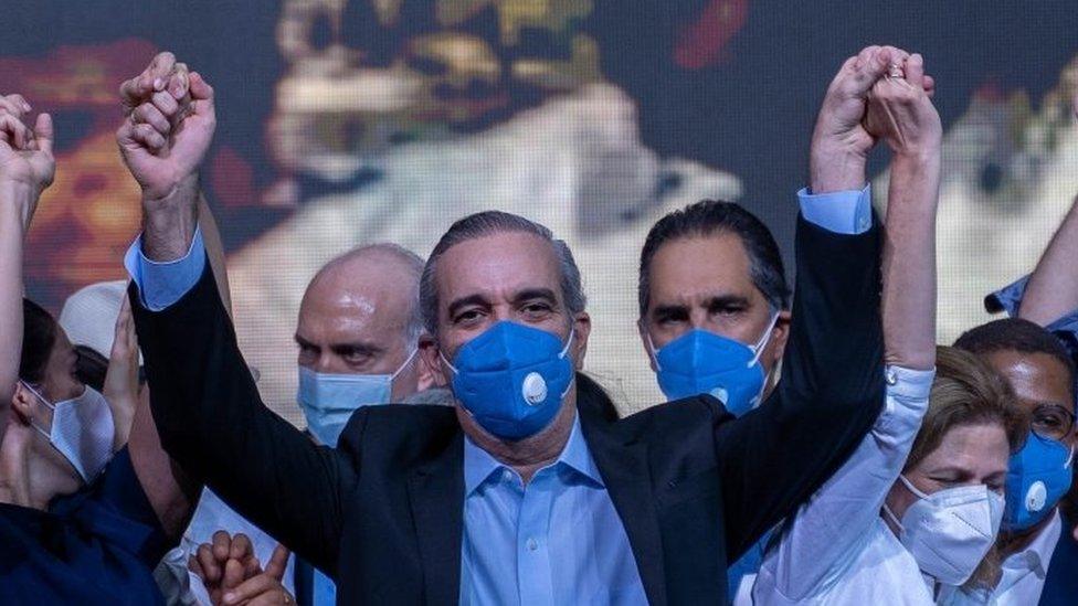 Luis Abinader (C) celebrates at an election night event in Santo Domingo, Dominican Republic, 05 July 2020.