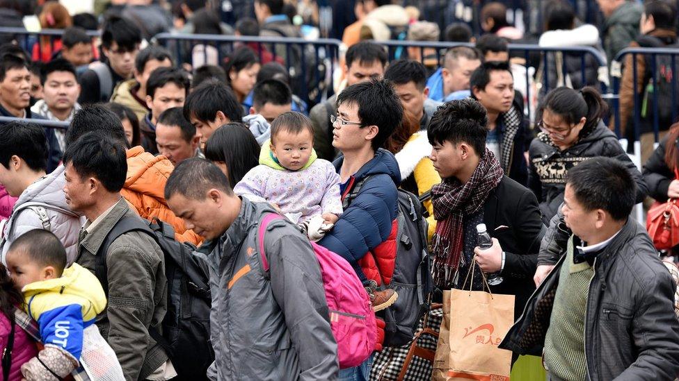 Stranded passengers outside the Guangzhou Railway Station