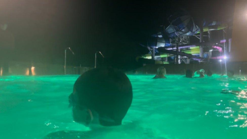 People enjoying one of Alpamare's two outdoor pools