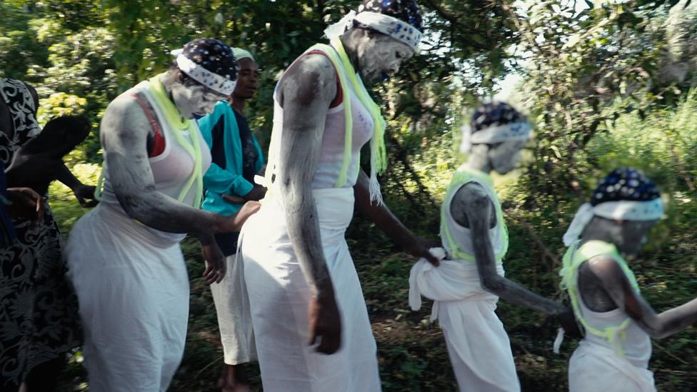 Women taking part in a religious ritual