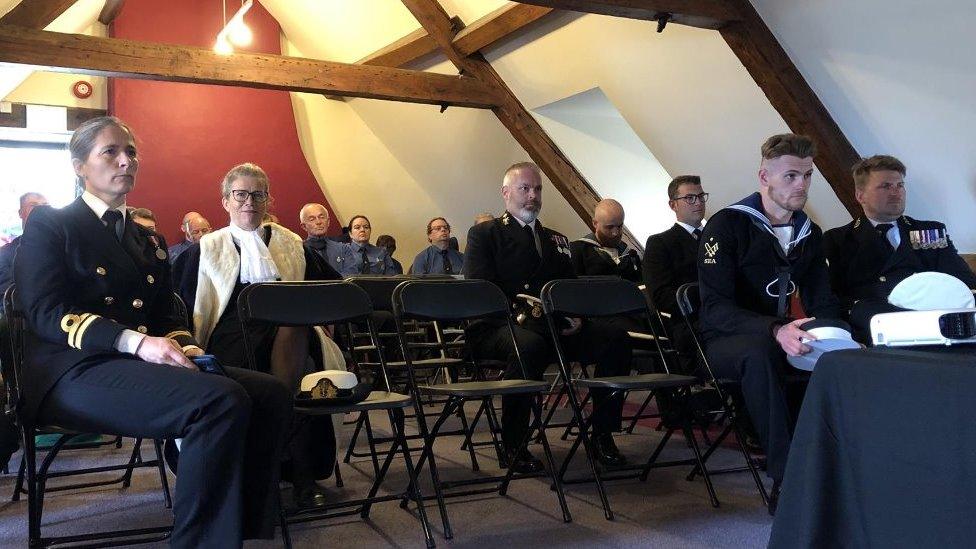 Members of the parade and Guernsey's Deputy Bailiff