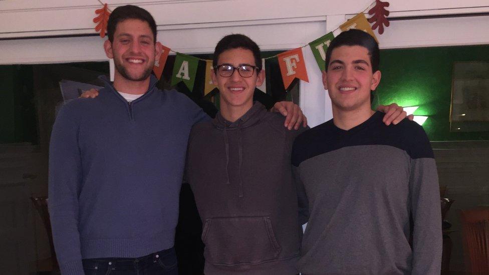 Josh Fidel (centre) pictured with his brothers Matt (left) and Noah (right)