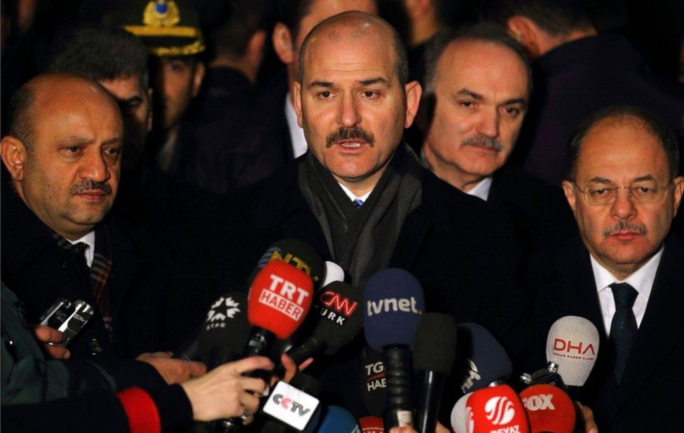 Turkish Minister of the Interior, Suleyman Soylu (centre) speaks to journalists on December 19 after Andrey Karlov, the Russian ambassador to Ankara, was assassinated