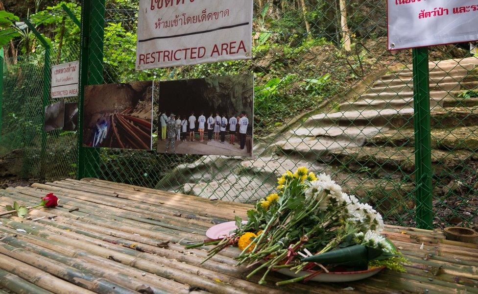 The sealed-off entrance to the Tham Luang caves