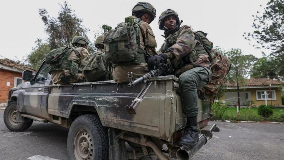 M23 rebels in Goma (file photo); soldiers sit on the back of a truck. 