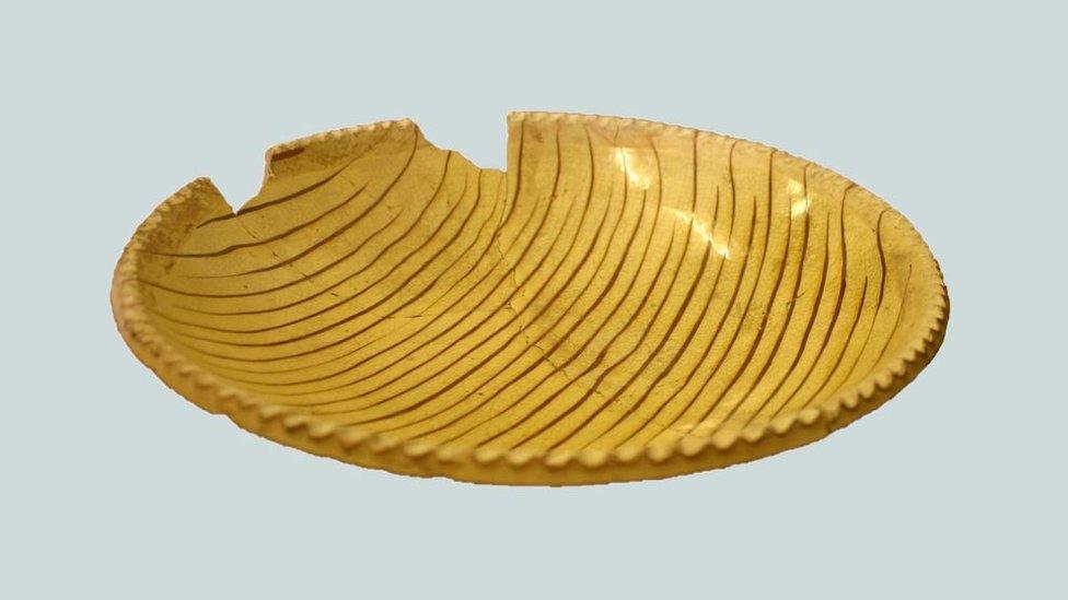 Yellow slipware dish