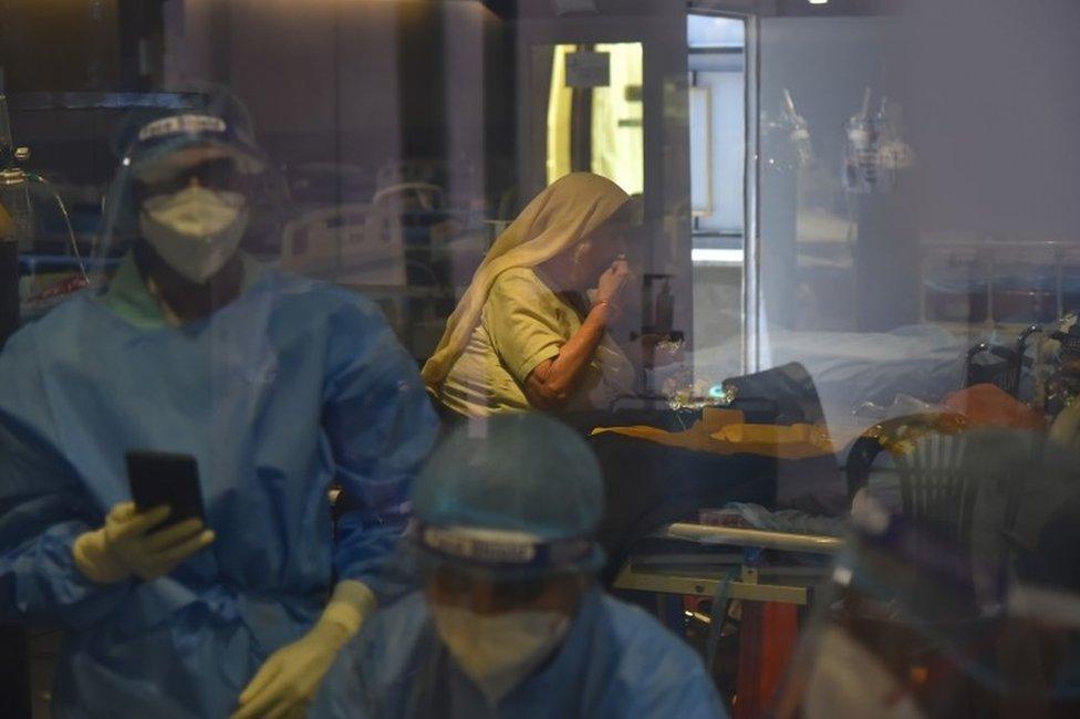 Indian doctor wearing Personal Protective Equipment (PPE) is seen inside a COVID-19 care centre and isolation ward facility near a Hospital in New Delhi, India, 24 May 2021.