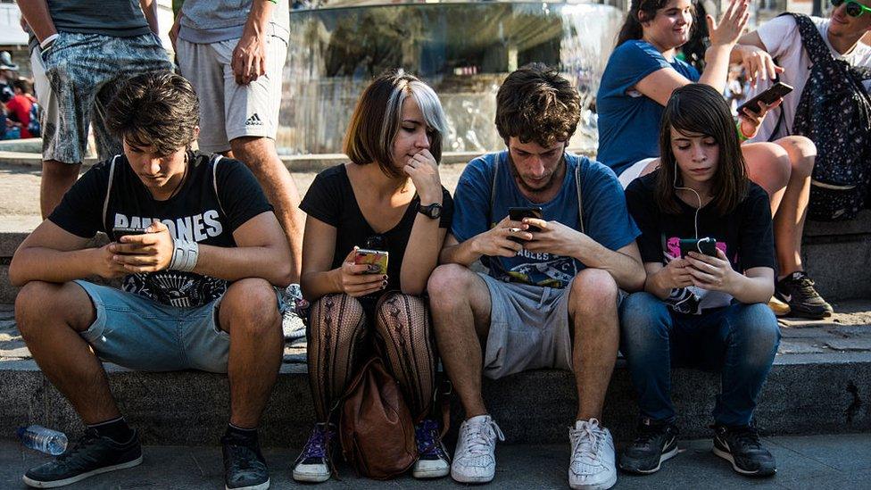 people on phones